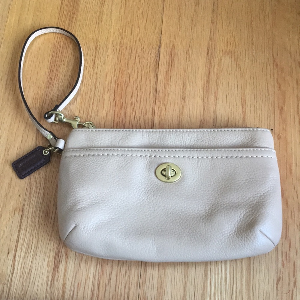Gently used Coach beige wristlet